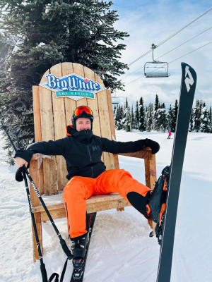 Mike smiling in a chair