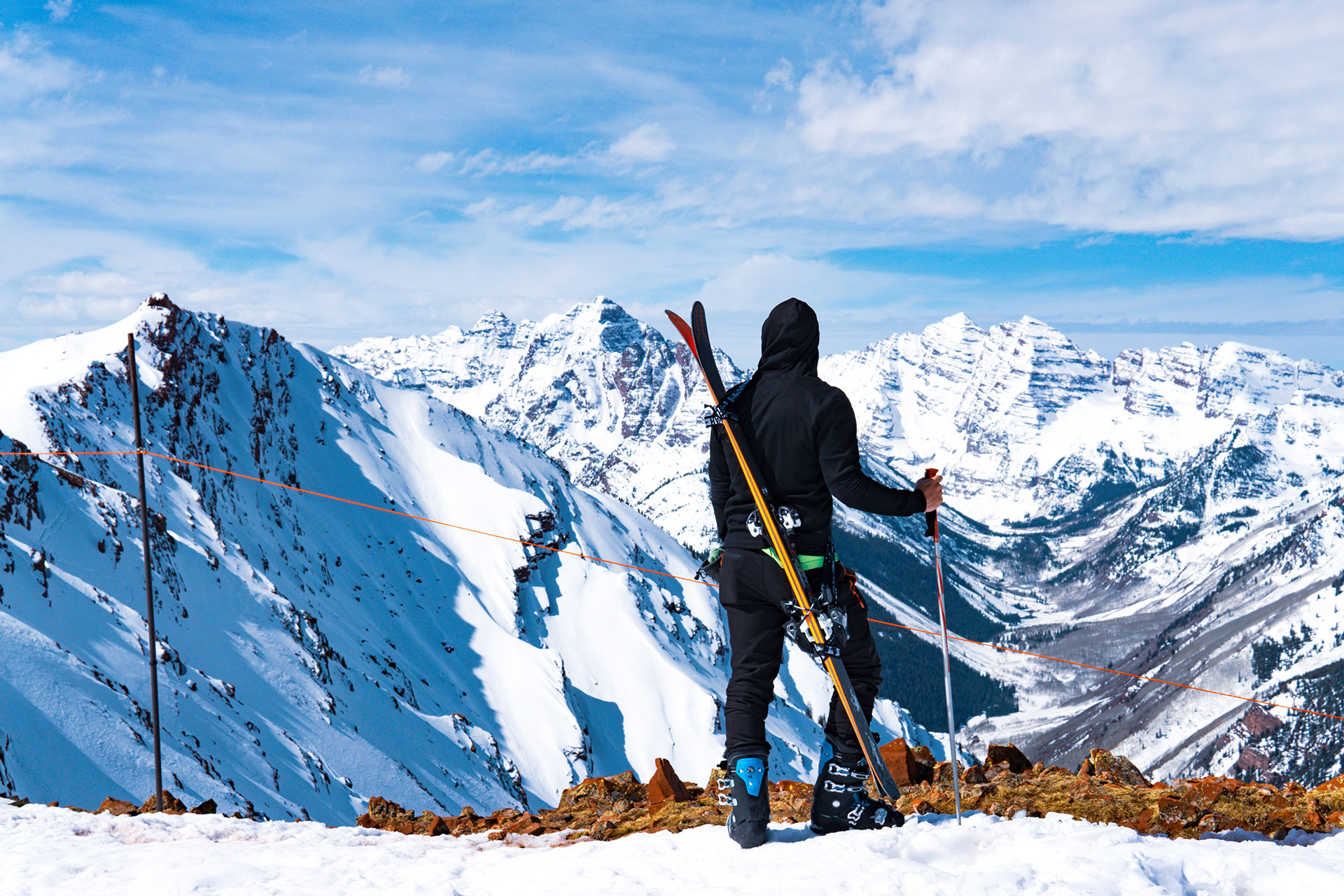 a ski instructor in canada looking out over the rocky mountains