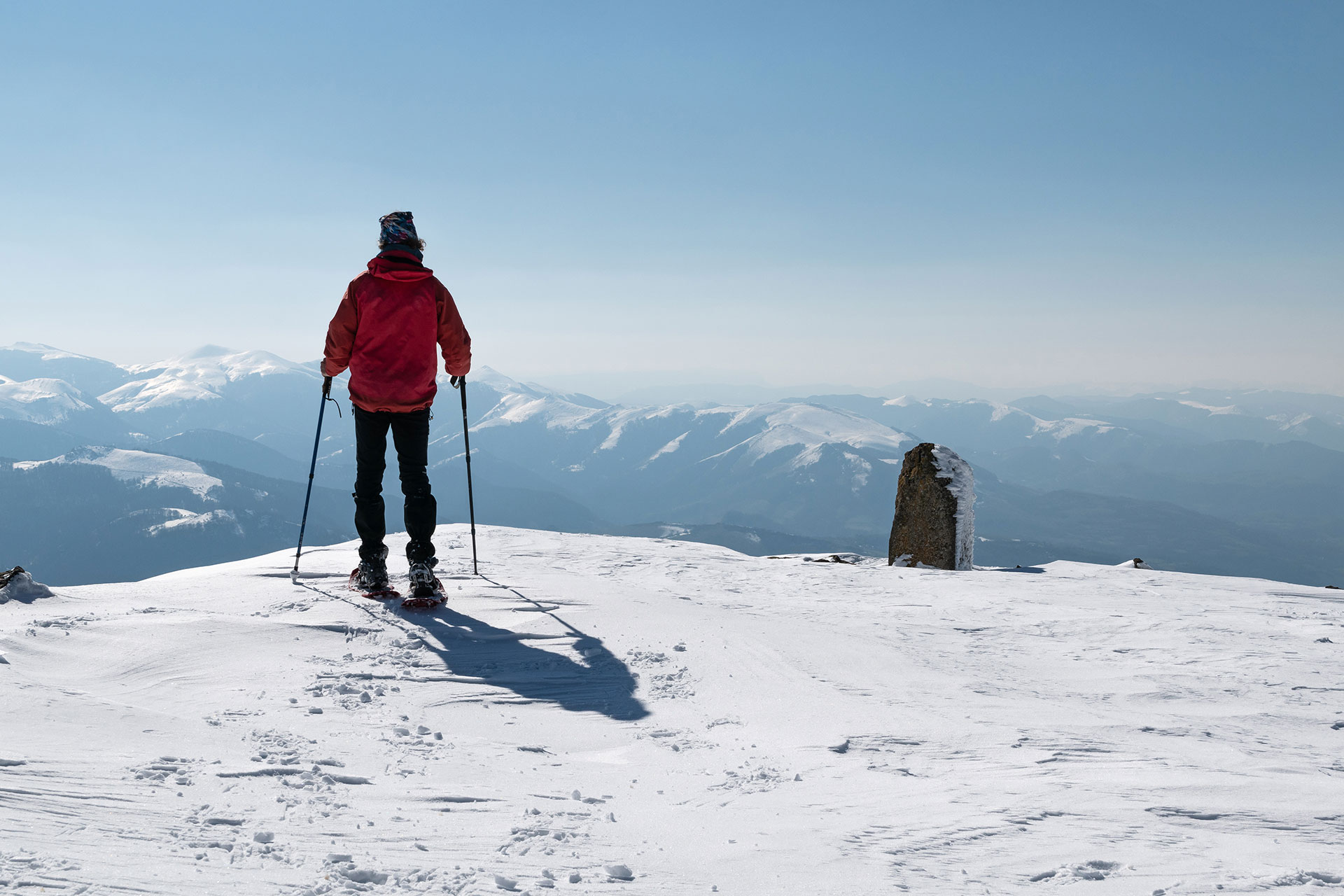 after becoming a ski instructor in canada looking out over other mountains